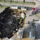 An aerial view shows a sinkhole in the Ospedale del Mare hospital car park.